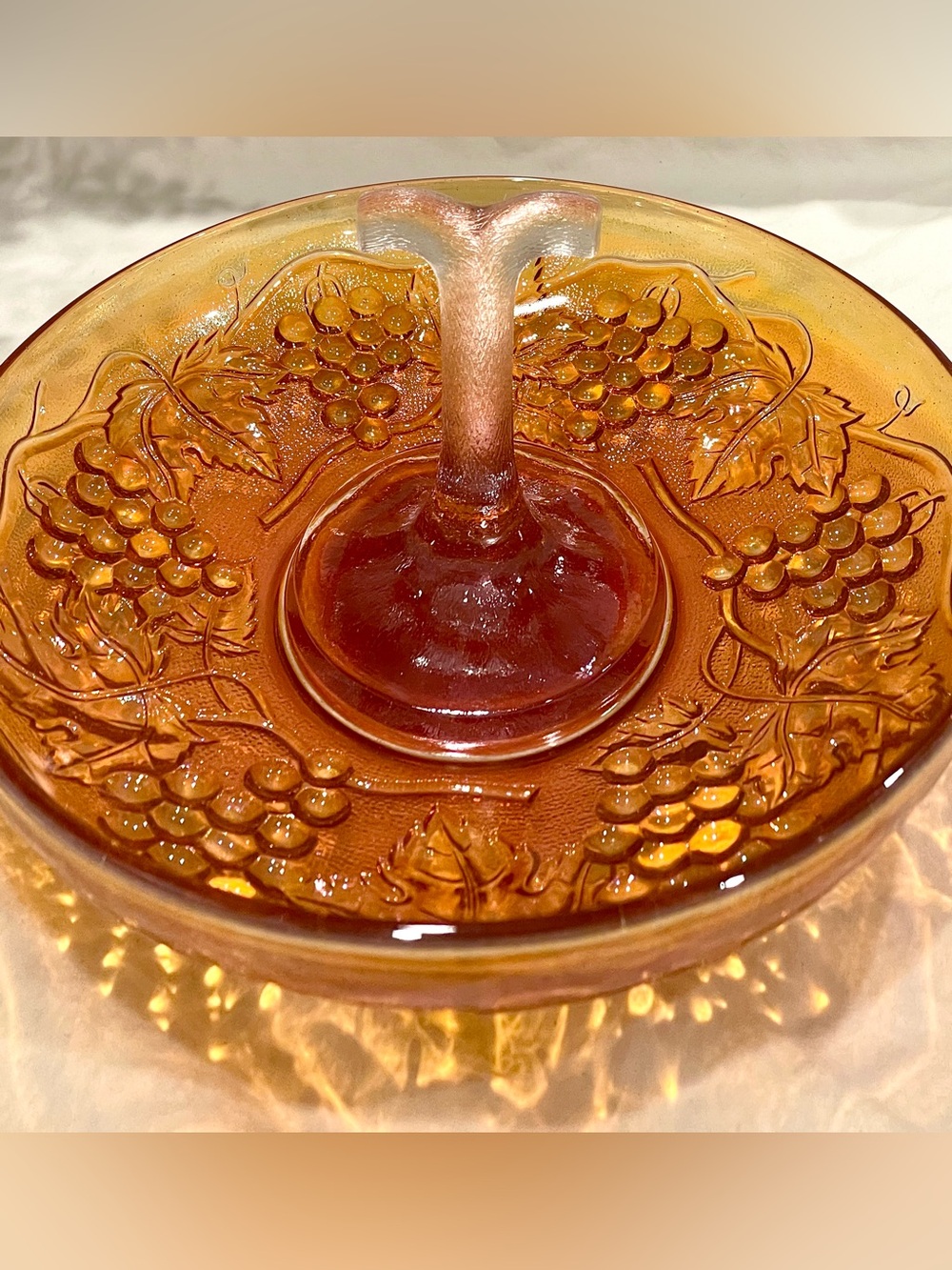 Imperial Glass “Grape” Pattern Marigold Carnival Glass. Twig Center Handle.